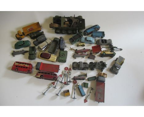 Playworn Dinky vehicles including cars, trucks, vans, army, sports cars and road signs and a clockwork tank chassis, P (Est. 