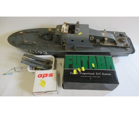 Radio controlled Torpedo boat of wood construction fitted with electric motors, some damage, parts detached, F, and an O.P.S.