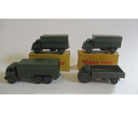 Four Dinky army vehicles comprising three 3-ton wagons and a 10-ton wagon, two items boxed, F-G (Est. plus 21% premium inc. V