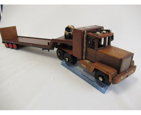 A wooden American type truck and trailer finished in varnished wood, approximately 1:8 scale, G (Est. plus 21% premium inc. V