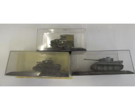 Three diecast army vehicles comprising Sherman tank, Tiger tank and Land Rover, all items boxed, E (Est. plus 21% premium inc