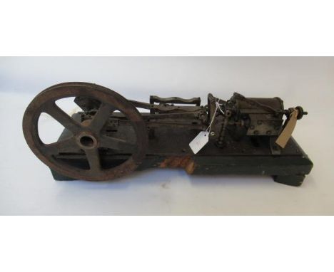 A single cylinder reversing horizontal mill steam engine fixed to a wooden base, rusting to steel parts, 20" x 7" x 10", F (E