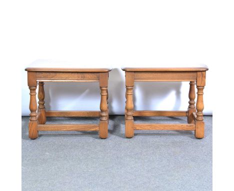 Pair of Ercol elm lamp tables, each with rectangular top, turned legs joined by rails, the top 47x37cm, height 39cm.Qty: 2Con