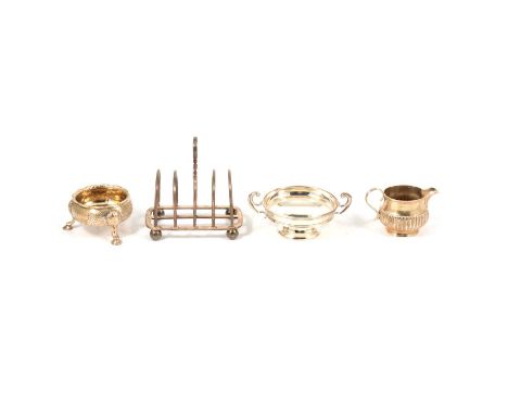 A silver toast rack, Goldsmiths & Silversmiths Co Ltd, London 1927, four sections, stamped Goldsmiths & Silversmiths Company 