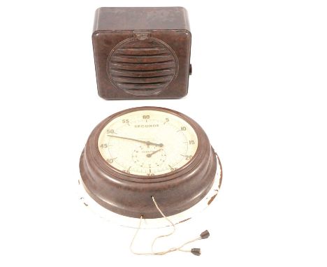 Bakelite case 'seconds dial' wall clock, diameter 32cm, and a bakelite speaker.Qty: 2