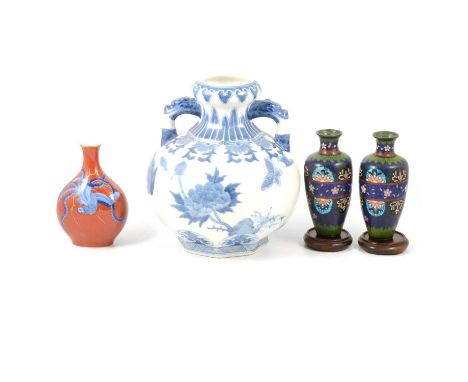 Modern Chinese porcelain twin-handled vase, blue and white decoration, 24cm; a Japanese porcelain vase, brick-red ground with