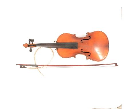 German violin, Stradivarius copy, 36cm two piece back, lacking strings, with a bow.