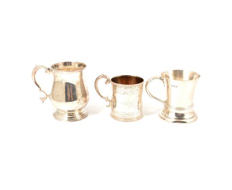 A silver tankard, Martin, Hall & Co, Sheffield 1842, engraved scroll design and vacant cartouche to centre, engraved borders,