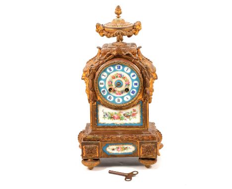 A 19th Century French ormolu and porcelain mantel clock, cylinder movement stamped Rollin a Paris striking on a bell, 38cm.