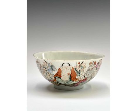 A Chinese famille rose porcelain bowl, Qianlong red seal mark, decorated with numerous figures and a stylised tiger, the inte