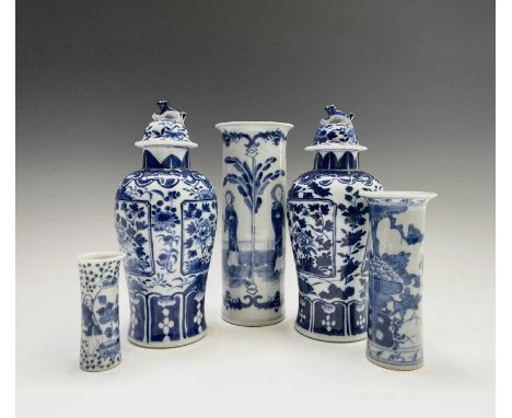 A pair of Chinese porcelain blue and white vases and covers, 19th century, with four character Kangxi mark, height 23cm, widt