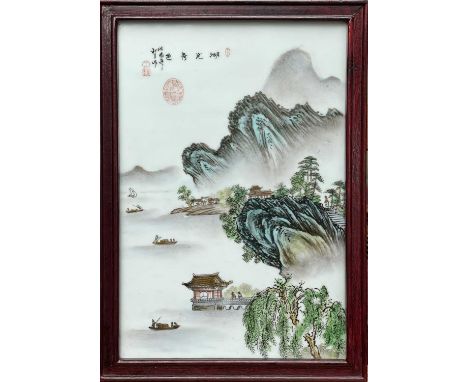 A Chinese porcelain plaque, 20th century, decorated with a river scene, calligraphy and seal marks 41 x 29cm.Condition report