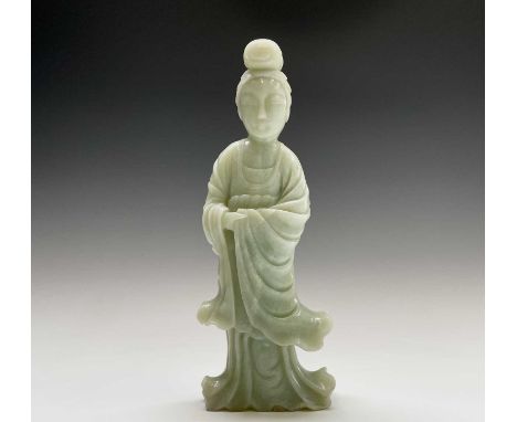 A large Chinese carved jade figure of a lady, 20th century, height 36.5cm, with 13.5cm.Condition report: Very small chips in 