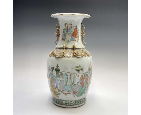 A Chinese famille verte porcelain baluster vase, 19th century, decorated with figures within an interior scene, height 42cm, 