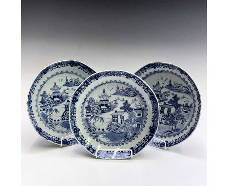 A set of three Chinese Export porcelain blue and white dishes, Qianlong Period (1736-1795), each decorated with pagodas and a