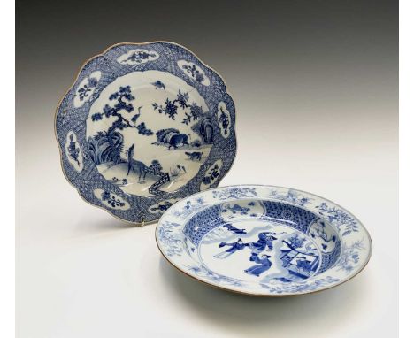 Two Chinese porcelain blue and white dishes, 18th century, the first decorated with a warrior and other figures, diameter 21.