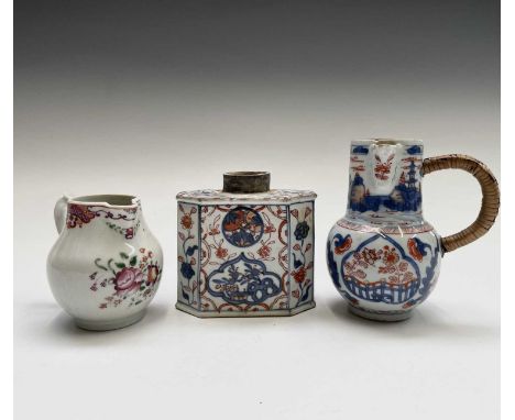 A Chinese famille rose porcelain jug, height 9.5cm, a Chinese Imari jug,height 14cm and a Chinese Imari porcelain tea caddy, 