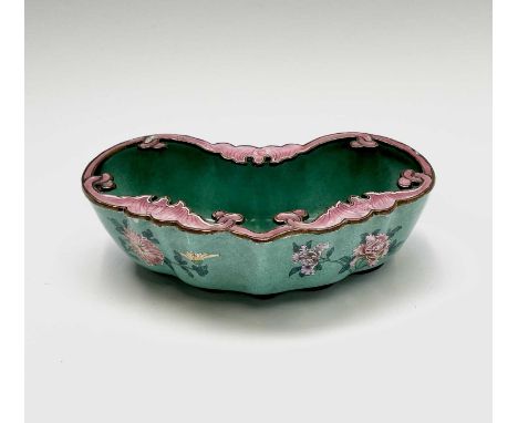 A Chinese enamel and gilt metal brush washer, 19th century, decorated with pink stylised bats around the top rim, with floral