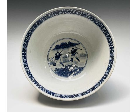 A large Chinese porcelain blue and white punch bowl, late 19th century, four character Kangxi mark, decorated with hunting sc