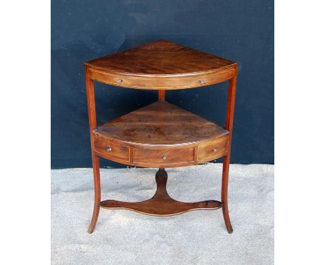 Regency mahogany corner stand with bowfronted top over open shelf, boxwood strung frieze drawer and raised on square legs ter