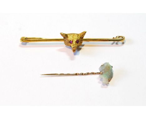 9ct gold pin with fox head, 1947, and a scarf pin with carved opal fish.&nbsp; &nbsp;(2) 