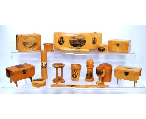 Collection of assorted Mauchline ware including needle cases, egg timer, cigarette boxes, egg cup etc., for Dunoon, Edinburgh