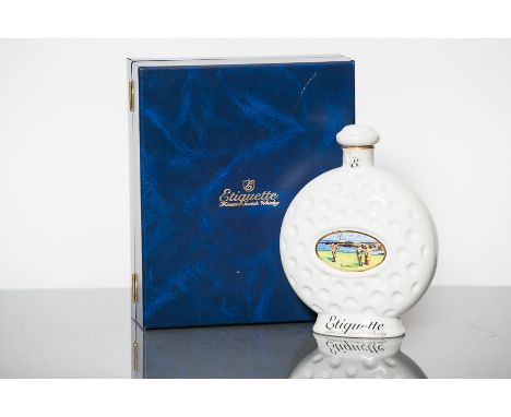 ETIQUETTE ST. ANDREWS FINEST SCOTCH WHISKY 
Blended Scotch Whisky by Scotia Duncarron, Denny, in golf themed ceramic decanter