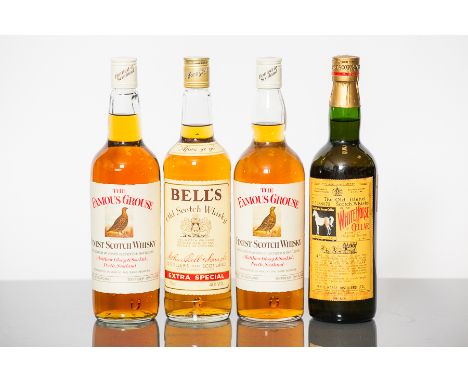 WHITE HORSE
Blended Scotch Whisky. No. 1388875. Imported for the Spanish market. No capacity stated. 30° U.P.
THE FAMOUS GROU