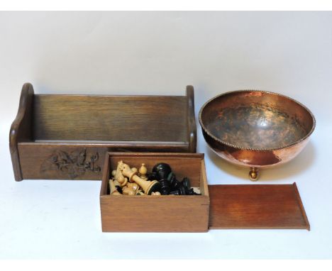 A Keswick school carved book trough, unmarked, vendor's mother attended KSIA, and a planished copper bowl stamped Dryad Leste