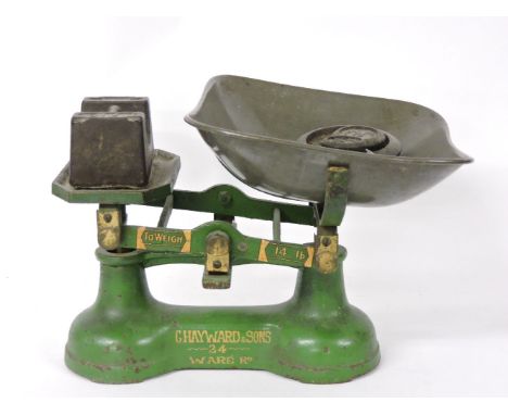 A set of grocer's scales and weights, painted green and inscribed in gilt G Hayward & Sons, Makers, Hertford