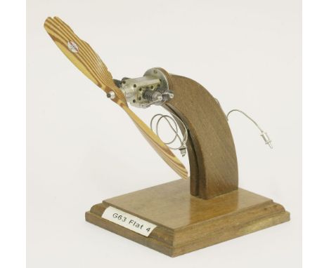 A Stefan Gasparin precision made miniature Co2 powered milled aluminium flat four aero engine, with laminated propeller blade