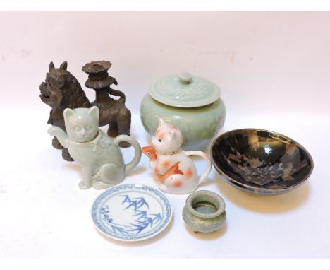 A collection of modern Chinese ceramics, comprising a miniature censor with crackled glaze, a celadon pot and cover, a black 