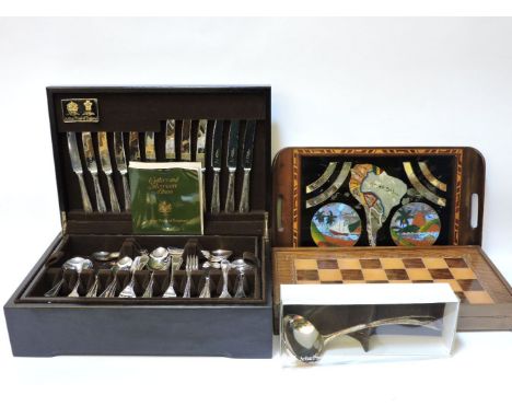 A canteen of plated cutlery, a boxed chess set, an inlaid tray, etc