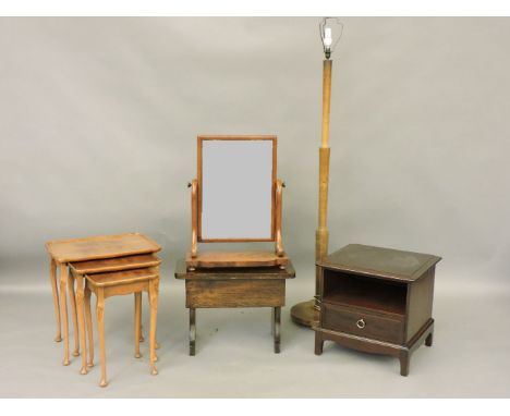 A Victorian toilet mirror, a nest of three tables, a dark stained work table, a Stag bed side cabinet, and a standard lamp