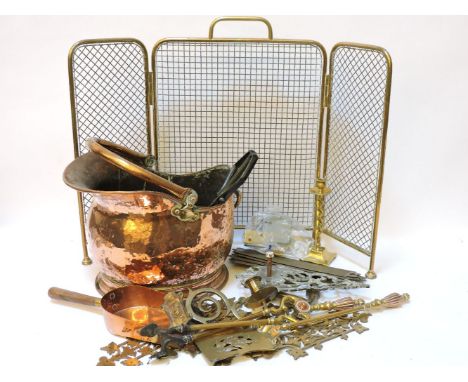 A copper coal scuttle, brass and copper fire tools, brass finger plates, a brass door knocker, etc