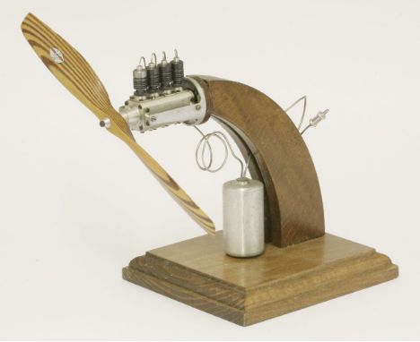 A Stefan Gasparin precision made miniature Co2 powered milled aluminium straight four aero engine, with laminated propeller b