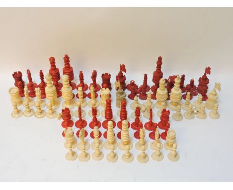 Two bone and stained turned chess sets, and a carved Vizagapatam part chess set