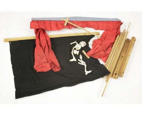 A Pelham Puppet, Skeleton, in a manila box, with red/blue label, with instructions, and a puppet theatre