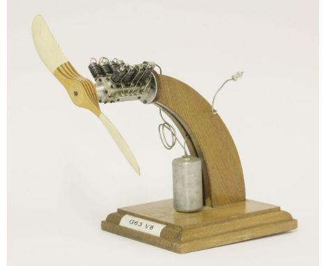 A Stefan Gasparin precision made miniature Co2 powered milled aluminium V8 aero engine, with laminated propeller blade, and o