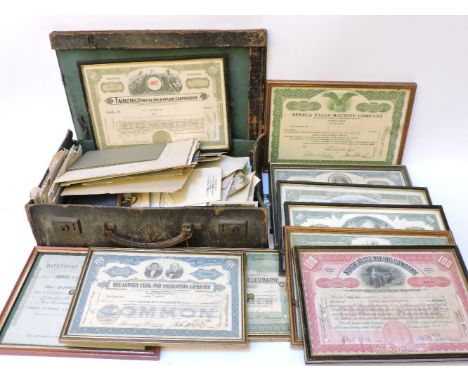 A small case of ephemera, cards, and related items, and eleven framed share certificates