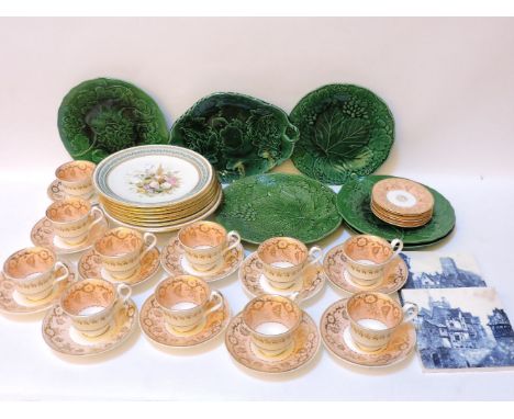 A Royal Worcester and painted porcelain part dessert service, puce back stamp and dated 1877, some Wedgwood leaf moulded plat