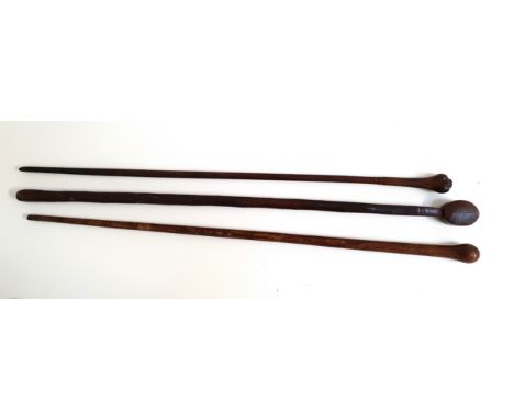 VINTAGE HARDWOOD ROOT BALL WALKING STICKwith a naturalistic handle and tapering column, 88.5cm high, together with two other 