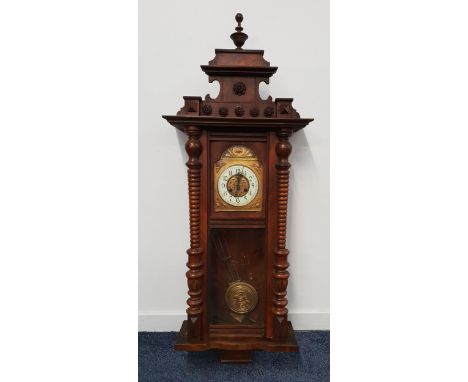 19th CENTURY WALNUT REGULATOR WALL CLOCKthe brass and enamel dial with Arabic numerals and an eight day movement, 130cm high 