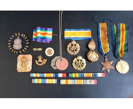 SELECTION OF MILITARY BADGES AND MEDALSincluding a WWI victory medal, The 1934-1945 Star, various ribbons, two brass RAF cap 