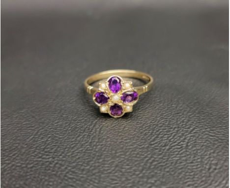 PRETTY AMETHYST AND PEARL CLUSTER RINGthe five seed pearls interspersed with four oval cut amethysts, on a nine carat gold sh