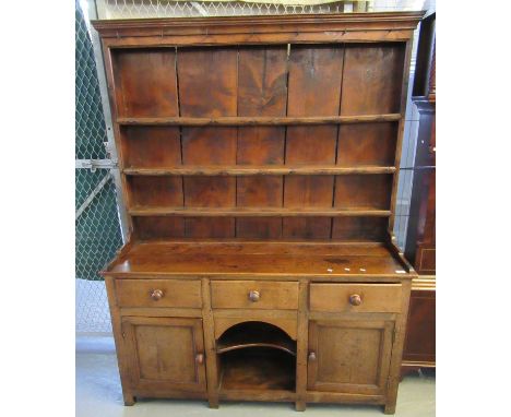 19th century Welsh oak two-stage rack-back dog kennel dresser, the moulded cornice above boarded rack with iron hooks and thr