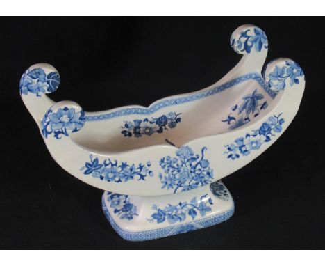 19th century Spode china blue and white transfer printed stilton cradle of scrolled pedestal form, decorated with sprays of f