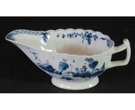 18th century Worcester porcelain 'The Fringed Tree' design fluted pedestal sauce boat having loop handle and interior foliate