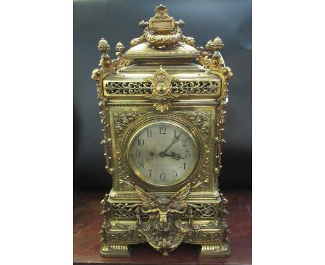 Massive late 19th century two train Gothic design brass mantle/bracket clock, the case with pagoda hood decorated with swags 