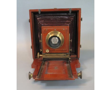 Late 19th century J Lancaster &amp; sons of Birmingham brass and mahogany plate camera with extending bellows, two dark slide